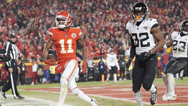 Jan 21, 2023; Kansas City, Missouri, USA; Kansas City Chiefs wide receiver Marquez Valdes-Scantling (11) scores a touchdown against the Jacksonville Jaguars during the second half in the AFC divisional round game at GEHA Field at Arrowhead Stadium. Mandatory Credit: Denny Medley-USA TODAY Sports